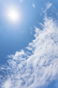Beautiful full clouds on blue sky background. Elegant white clouds in daylight. Sunny day.