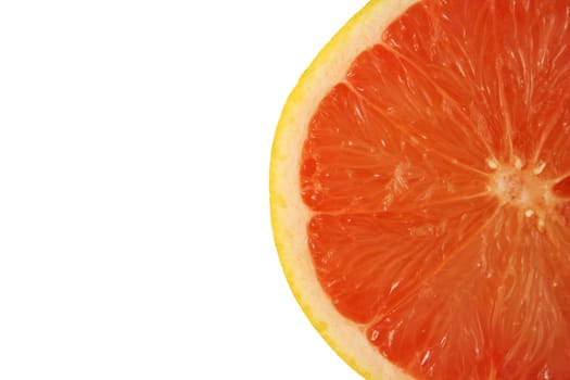 A Isolated pink grapefruit half on white