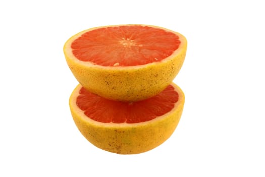 A Isolated pink grapefruit halveson white