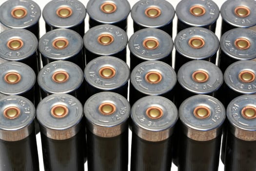 12 gage black shotgun shells background image