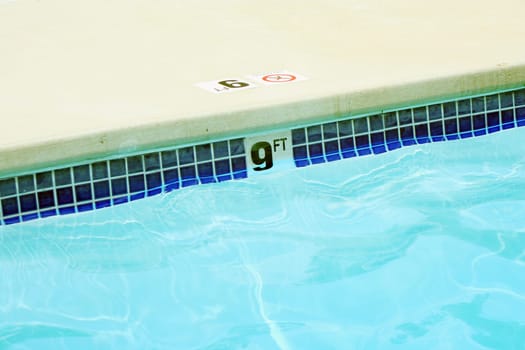 A Nine foot swimming pool water marker