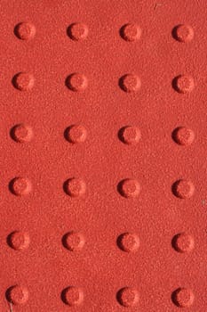 A Red sidewalk non slip pad background