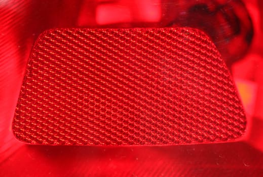A red car tail light backkground