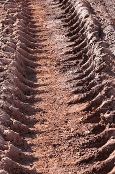 a tire track in the mud