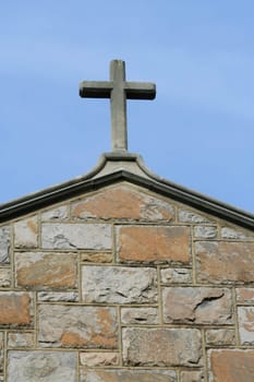 A cross on top of a church building