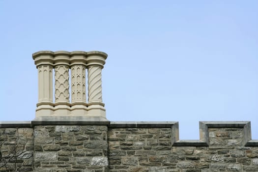 Some old chimneys on a roof