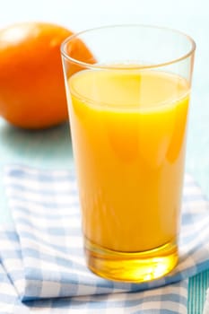 Fresh orange juice in a glass. Studio shot.