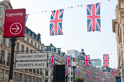 LONDON - APRIL 24: Central London hangs up buntings for Prince William and Catherine Middleton&#039 s royal wedding celebration to take place April 29 at Westminster Abbey. April 24, 2011 in London, England.