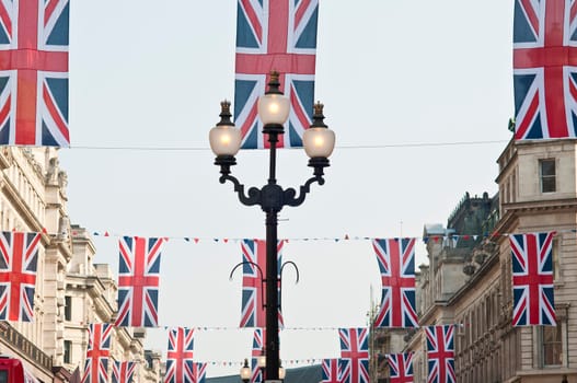 LONDON - APRIL 24: Central London hangs up buntings for Prince William and Catherine Middleton&#039 s royal wedding celebration to take place April 29 at Westminster Abbey. April 24, 2011 in London, England.