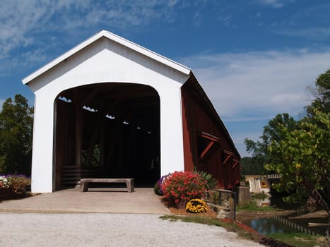 Red and white covered bridge in Indiana.