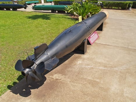 Black torpedo displayed in Pearl Harbor, Hawaii.