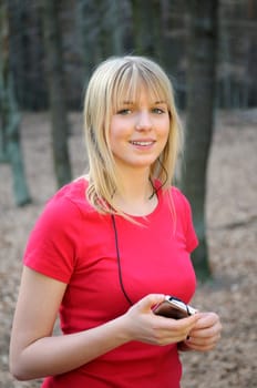 Young woman with mp3 player