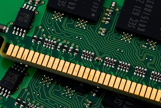 a closeup of the connectors on a computer memory module