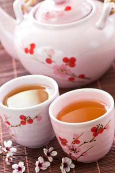 Green tea set with teapot and cups