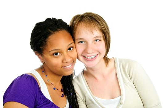 Isolated portrait of two diverse teenage girl friends