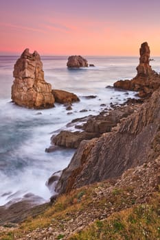 Amazing seascape sunrise at winter. Los Urros, Spain