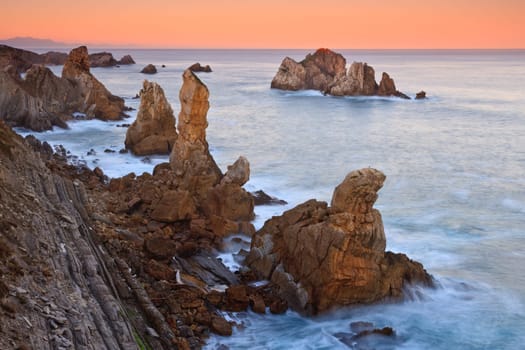Amazing seascape sunrise at winter. Los Urros, Spain