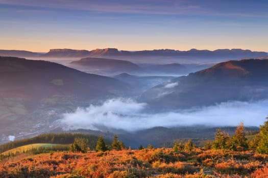 Mountains over the fog in the winter sunrise, Bizkaia, Spain