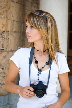 beautiful young woman taking photos