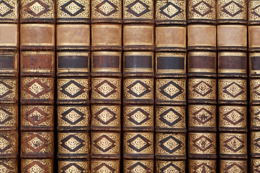 Old antique books,with hard cover on a shelf