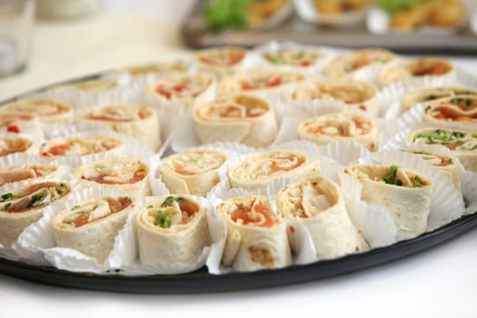 Finger food - deliciously arranged - side close-up - vertical