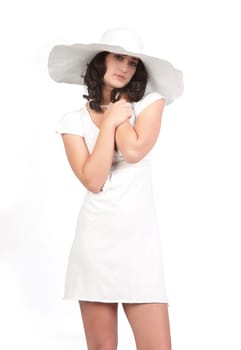 beautiful young fashion woman in white dress and hat