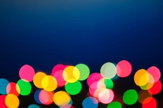 Out of focus multicolored Christmas light background