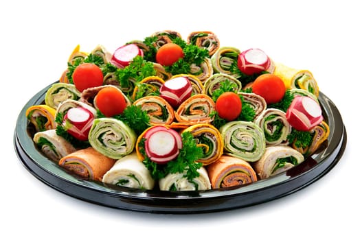 Isolated platter of assorted meat tortilla wraps