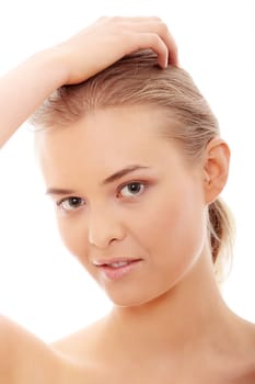 Portrait of the attractive girl without a make-up, isolated on white background