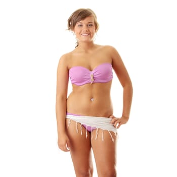 Summer girl in pink swimwear, isolated on white background