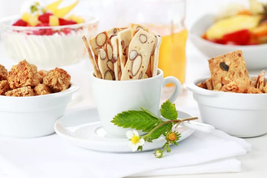 Healthy breakfast with yogurt, fresh fruits and cereal sticks