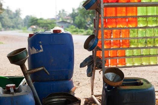 Gas station in Asia,the fuel is in bottles of one liter