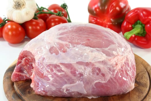 a piece of pork nut on a wooden board