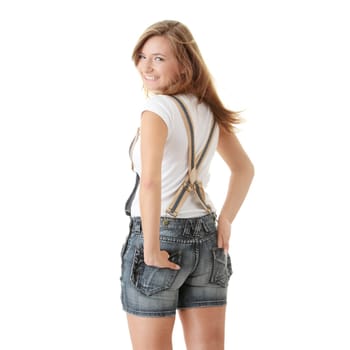 Young happy summer caucasian girl in shorts isolated on white background
