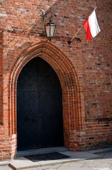 Image of a medieval gothic closed door.