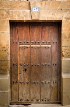 Architectural detail. Antique wooden door, Labastida, Alava, Spain