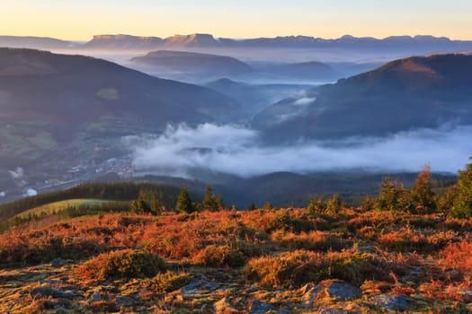 Mountains over the fog in the winter sunrise, Bizkaia, Spain