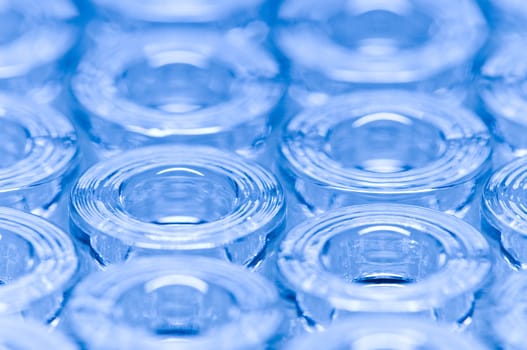 Detail macro shot of blue glass ampoules