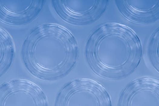 Detail macro shot of blue glass ampoules