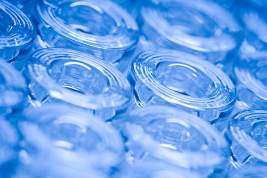 Detail macro shot of blue glass ampoules