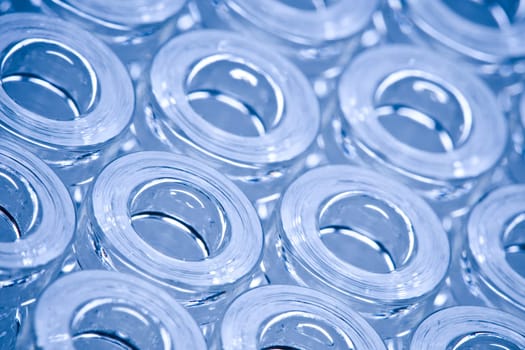 Detail macro shot of blue glass ampoules