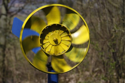 Spinning wind chime in a garden