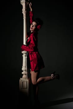 beautiful young glamorous woman  with lightpole