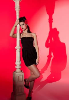 beautiful young glamorous woman  with lightpole