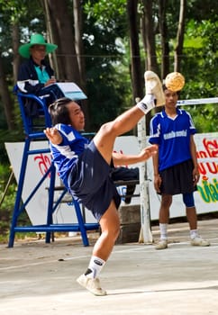 HNONG MAIN NGAM,OCT. 10,2010: A Sepak Takraw player scoring for his team at a local competition. Hnong Main Ngam,Thailand,October 10,2010.
