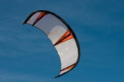 Kiteboarding kite in the blue sky
