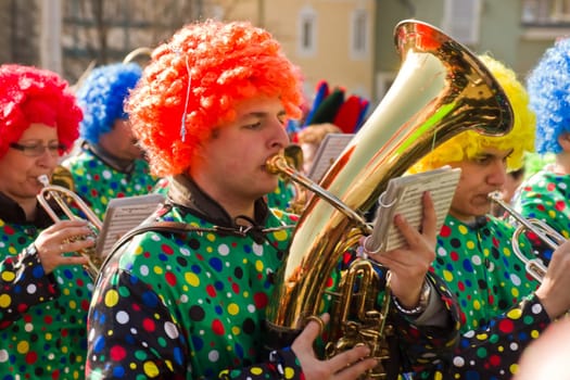 VILLACH,AUSTRIA - MARCH 5,2011: Musicians took the street at the annual carnival procession held on Mar. 5,2011 in Villach,Austria. Participants come from Austria,Italy and Slovenia.