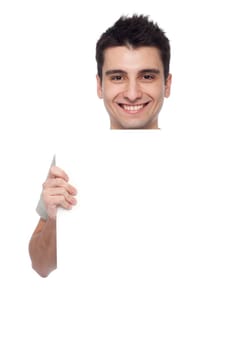 handsome young man displaying a banner ad isolated on white background
