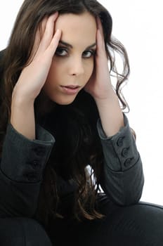 Young woman in depression with head in hands