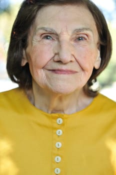 Close-up portrait of  eighty-something senior woman